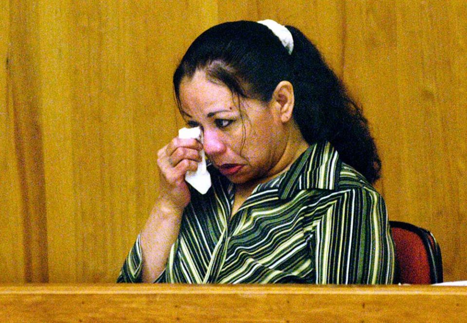 Melissa Lucio wipes her eyes in a courtroom in Brownsville, Texas, on July 10, 2008, the day she was sentenced to death for the murder of her 2-year-old daughter, Mariah. (AP/Valley Morning Star/Theresa Najera)