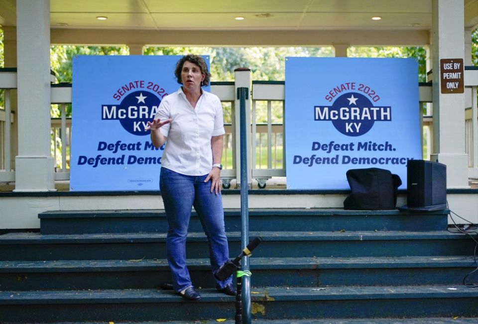 U.S. Senate candidate Amy McGrath rallies with supporters during a campaign stop at Woodland Park in Lexington, Kentucky, Aug. 25. (AP Photo/Bryan Woolston) U.S. Senate candidate Amy McGrath rallies with supporters during a campaign stop at Woodland Park in Lexington, Kentucky, Aug. 25. (AP Photo/Bryan Woolston)