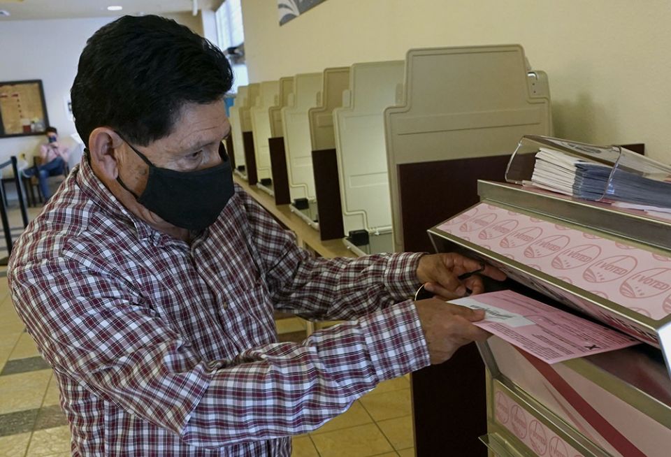 On Aug. 30, Francisco Torres casts his ballot at the Sacramento County Registrar of Voters office in Sacramento, California. (AP/Rich Pedroncelli, File)