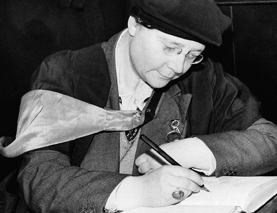 Dorothy L. Sayers signs a visitors' book Feb. 6, 1942, at St. Martin-in-the-Fields church in London, where she addressed the congregation at a lunchtime service. (AP Photo) Dorothy L. Sayers signs a visitors' book Feb. 6, 1942, at St. Martin-in-the-Fields church in London, where she addressed the congregation at a lunchtime service. (AP Photo)