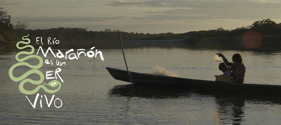 A poster proclaims that Peru's Marañón River is a living being. (Quisca Producciones and Radio Ucamara)