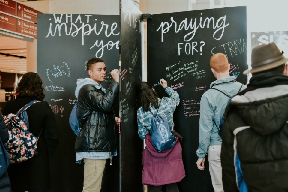 Attendees add prayer intentions and inspirational phrases to a display at the Student Leadership Summit, sponsored by the Fellowship of Catholic University Students in Chicago Jan. 2-6. (Courtesy of FOCUS) Attendees add prayer intentions and inspirational phrases to a display at the Student Leadership Summit, sponsored by the Fellowship of Catholic University Students in Chicago Jan. 2-6. (Courtesy of FOCUS)