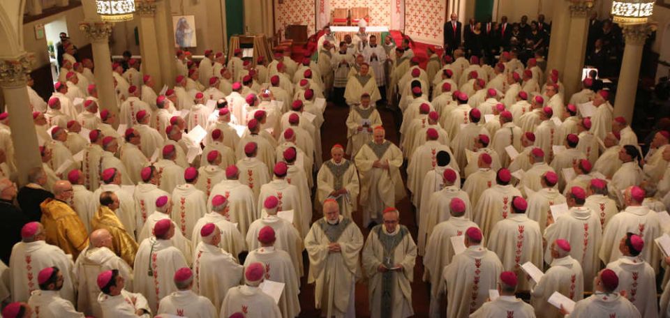 Bishops and altar servers process out after Mass at St. Peter Claver Church in Baltimore last year during the annual fall general assembly of the U.S. Catholic Bishops. (CNS/Bob Roller)