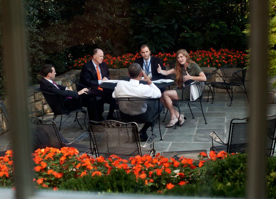 President Barack Obama meets with advisers, including Samantha Power (right), on the patio outside the Oval Office, Sept. 14, 2011. (Flickr/Obama White House/Pete Souza)