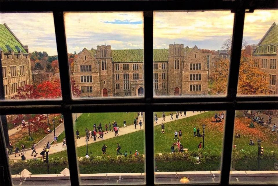 Students walk through a quadrangle on the campus of Boston College in this 2018 photo. (Wikimedia Commons/BCLicious)
