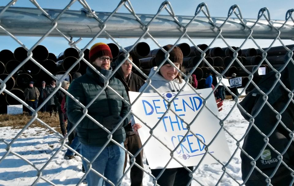 Brenna Cussen Anglada of St. Isidore Catholic Worker Farm heads a line of protesters risking arrest at a pipeline storage yard in Carlton County, Minnesota, April 9. (NCR photo/Maria Benevento) Brenna Cussen Anglada of St. Isidore Catholic Worker Farm heads a line of protesters risking arrest at a pipeline storage yard in Carlton County, Minnesota, April 9. (NCR photo/Maria Benevento)