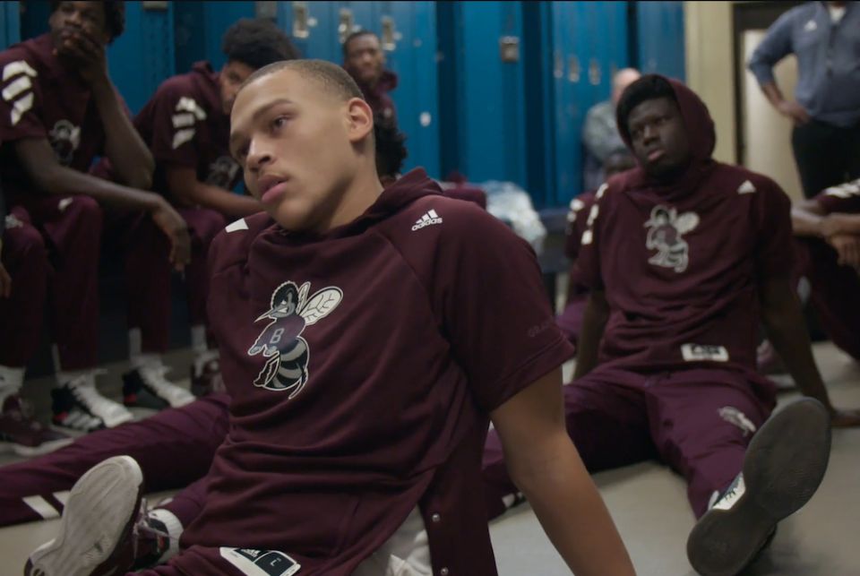 St. Benedict's basketball players C.J. Wilcher, left, and Madani Diarra sit in the locker room pictured in "Benedict Men" (Quibi/Whistle Studios) St. Benedict's basketball players C.J. Wilcher, left, and Madani Diarra sit in the locker room pictured in "Benedict Men" (Quibi/Whistle Studios)