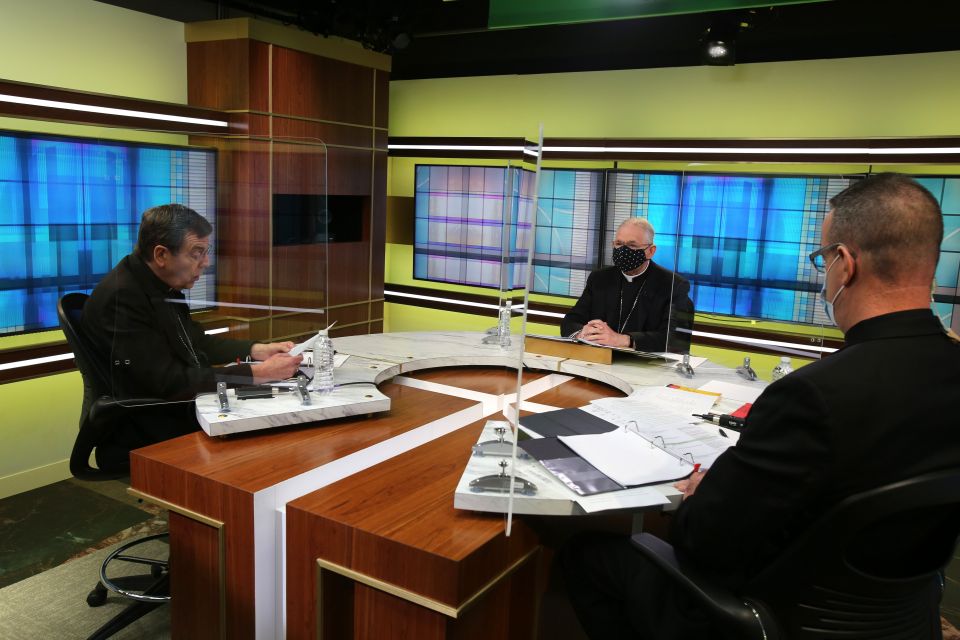 Detroit Archbishop Allen Vigneron, vice president of the U.S. Conference of Catholic Bishops, left, leads the opening prayer Nov. 17 at the conference's headquarters in Washington during the bishops' virtual fall meeting. Also pictured are Archbishop Jose Detroit Archbishop Allen Vigneron, vice president of the U.S. Conference of Catholic Bishops, left, leads the opening prayer Nov. 17 at the conference's headquarters in Washington during the bishops' virtual fall meeting. Also pictured are Archbishop Jose