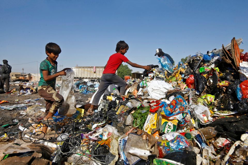 Iraqi children collect recyclable things from a garbage dump in Najaf, Iraq, Oct. 23. (CNS/Alaa Al-Marjani) Iraqi children collect recyclable things from a garbage dump in Najaf, Iraq, Oct. 23. (CNS/Alaa Al-Marjani)