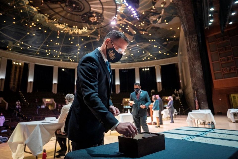 Pennsylvania elector and Attorney General Josh Shapiro casts his ballot during the 59th Pennsylvania Electoral College meeting in Harrisburg Dec. 14, where the state's 20 electors unanimously voted for Joe Biden. (CNS/Commonwealth Media Services via Reut 