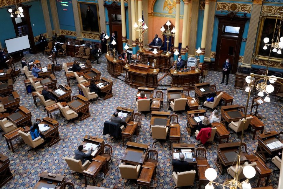 Michigan Lt. Gov. Garlin Gilchrist opens the state's Electoral College session at the state Capitol in Lansing Dec. 14, as the state cast all of its votes for President-elect Joe Biden. (CNS, pool via Reuters/Carlos Osorio)