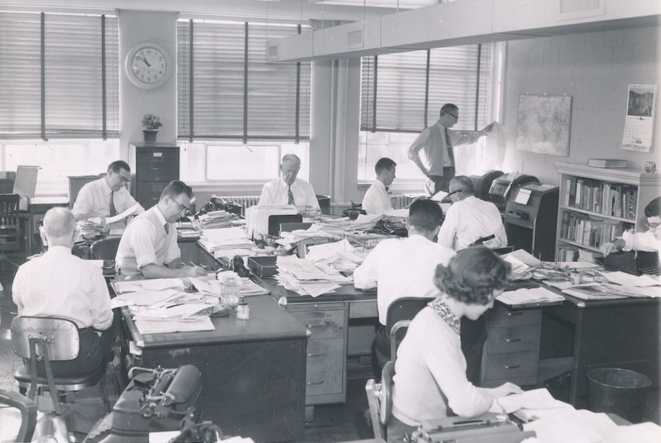 The newsroom of Catholic News Service's predecessor, NC News Service, is pictured in the 1950s. (CNS)