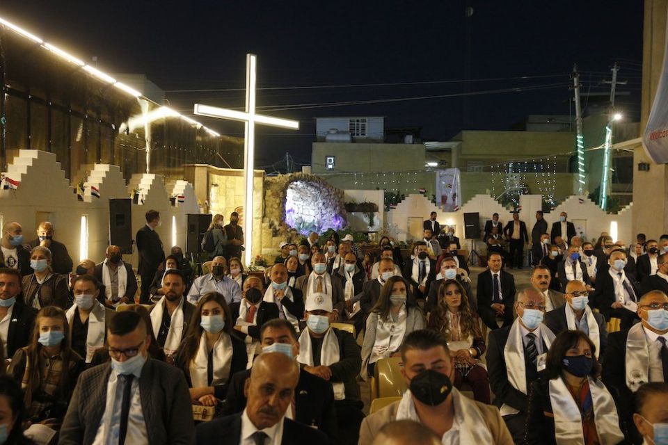 An overflow crowd is seen outside as Pope Francis celebrates Mass at St. Joseph Chaldean Catholic Cathedral in Baghdad March 6, 2021. (CNS/Paul Haring) An overflow crowd is seen outside as Pope Francis celebrates Mass at St. Joseph Chaldean Catholic Cathedral in Baghdad March 6, 2021. (CNS/Paul Haring)
