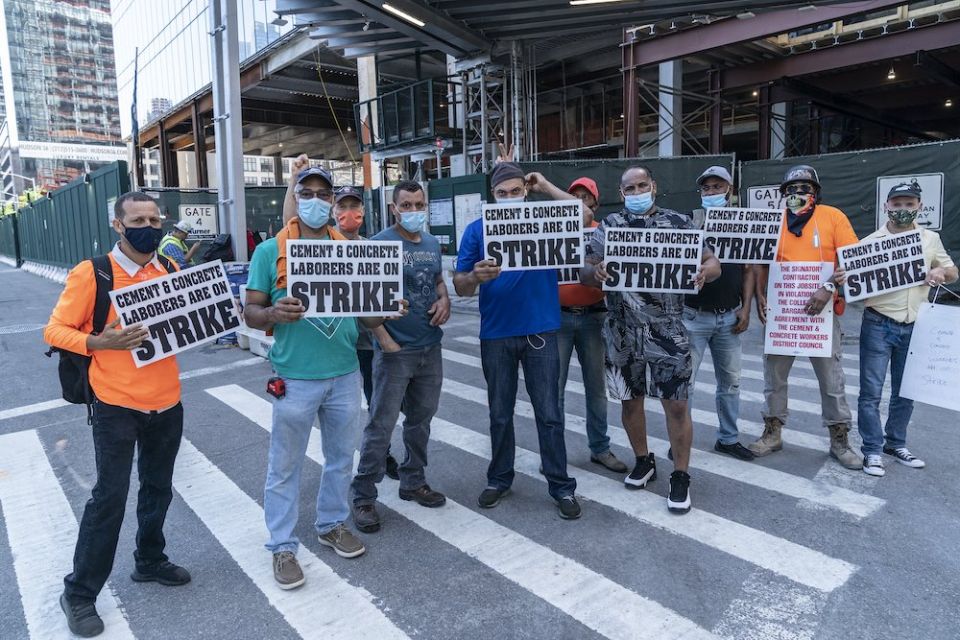 Union members in New York City hold a strike July 2. (CNS/Reuters/Sipa USA/Lev Radin)