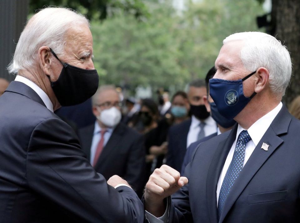 Democratic presidential nominee, former Vice President Joe Biden, left, and Vice President Mike Pence greet each other in New York City Sept. 11, marking the 19th anniversary of the 9/11 aviation terrorist attacks on the U.S. (CNS/Reuters/Amr Alfiky)