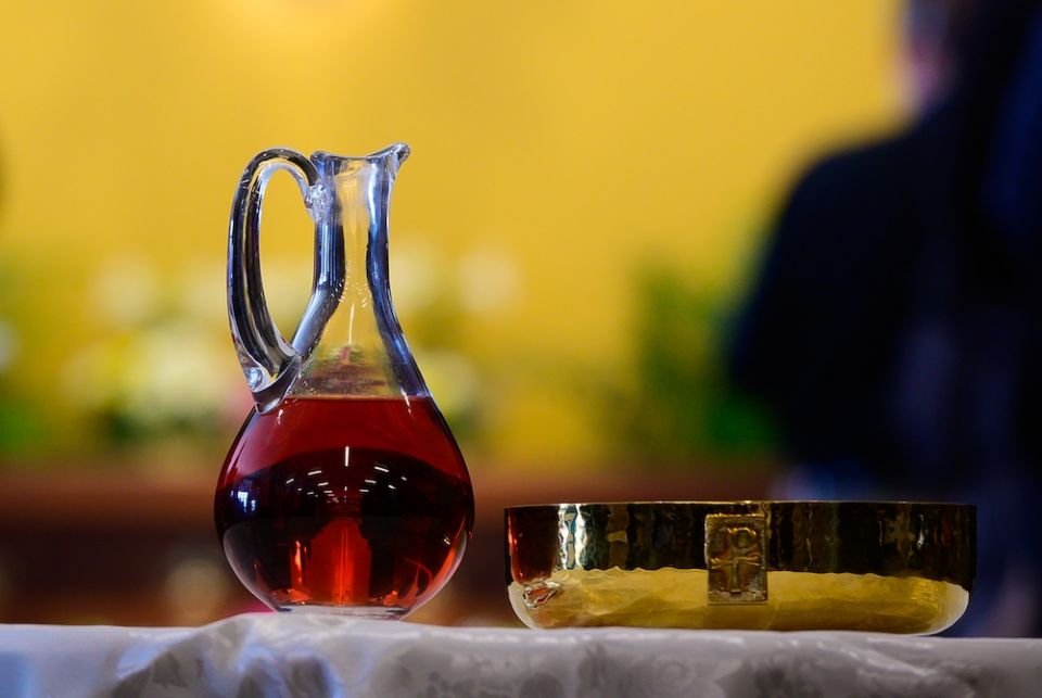 A cruet and ciborium hold wine and bread that will become the Body and Blood of Christ during Mass inside the Mother of Mercy Hall at the National Shrine of Our Lady of Good Help in Champion, Wisconsin, April 28, 2019. (CNS/The Compass/Sam Lucero) A cruet and ciborium hold wine and bread that will become the Body and Blood of Christ during Mass inside the Mother of Mercy Hall at the National Shrine of Our Lady of Good Help in Champion, Wisconsin, April 28, 2019. (CNS/The Compass/Sam Lucero)