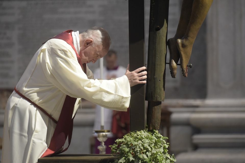 Pope Francis venerates the cross April 10, 2020, during the Good Friday Liturgy of the Lord's Passion in St. Peter's Basilica at the Vatican. (CNS/Vatican Media)