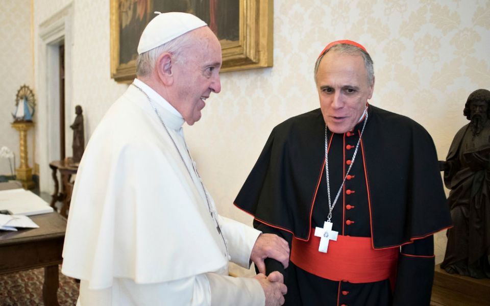 Pope Francis greets Cardinal Daniel DiNardo of Galveston-Houston, president of the U.S. Conference of Catholic Bishops, during a private meeting Oct. 9 at the Vatican. (CNS/L'Osservatore Romano)