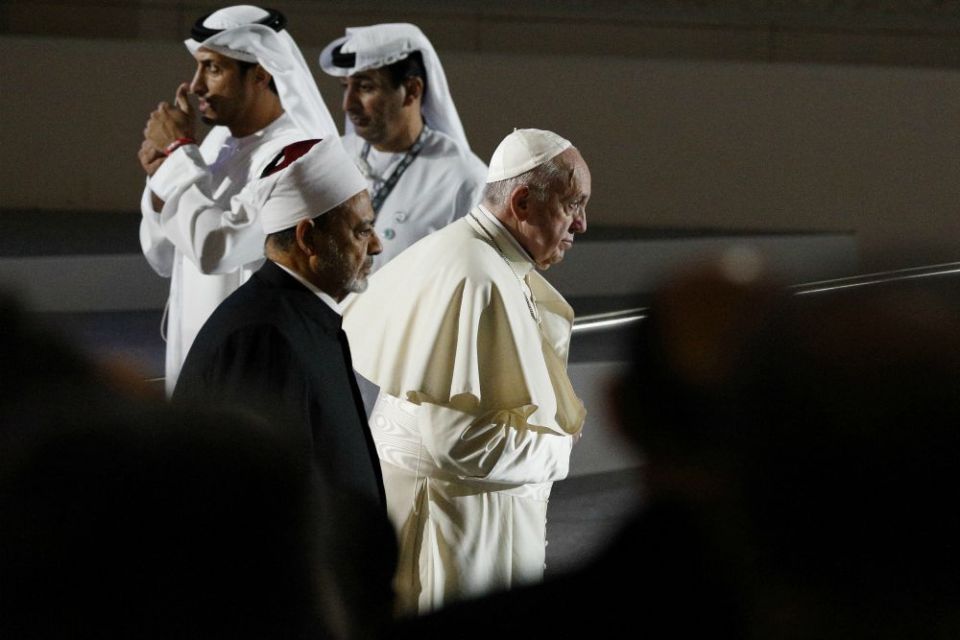 Sheik Ahmed el-Tayeb, grand imam of Egypt's al-Azhar mosque and university, and Pope Francis arrive for an interreligious meeting at the Founder's Memorial in Abu Dhabi, United Arab Emirates, Feb. 4. (CNS/Paul Haring)