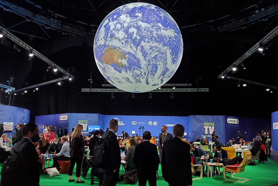 Some 20,000 delegates, and thousands more activists and advocates, are expected to attend the U.N. climate conference known as COP26, which began Oct. 31 in Glasgow, Scotland. Attendees are pictured at the summit Nov. 2. (EarthBeat photo/Brian Roewe)