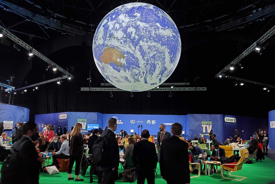 Some 20,000 delegates, and thousands more activists and advocates, are expected to attend the U.N. climate conference known as COP26, which began Oct. 31 in Glasgow, Scotland. Attendees are pictured at the summit Nov. 2. (EarthBeat photo/Brian Roewe) Some 20,000 delegates, and thousands more activists and advocates, are expected to attend the U.N. climate conference known as COP26, which began Oct. 31 in Glasgow, Scotland. Attendees are pictured at the summit Nov. 2. (EarthBeat photo/Brian Roewe)