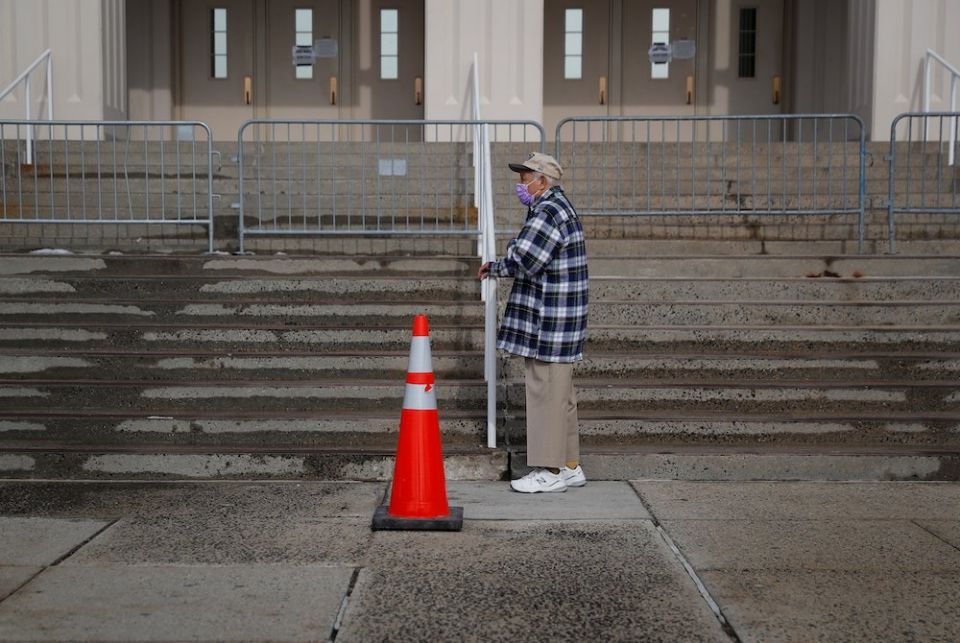 An elderly man in White Plains, New York, waits in line to receive a COVID-19 vaccine Feb. 23, 2021. (CNS/Reuters/Mike Segar) An elderly man in White Plains, New York, waits in line to receive a COVID-19 vaccine Feb. 23, 2021. (CNS/Reuters/Mike Segar)