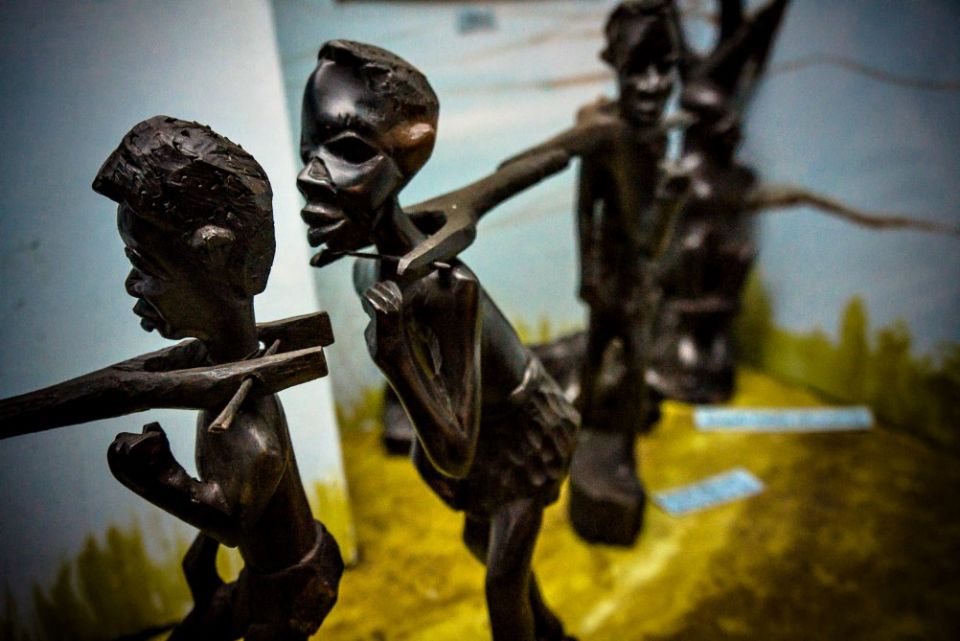 Carvings depict a caravan of people being taken into slavery at Lake Malawi Museum in Mangochi, Malawi. (Wikimedia Commons/Tim Cowley)