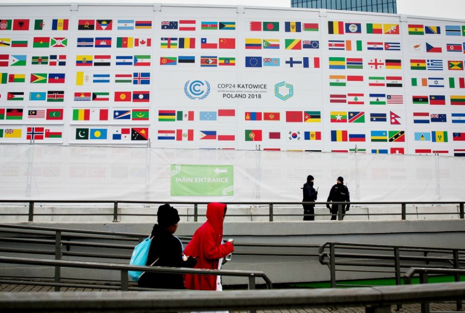 People walk past the International Congress Center during COP24, the U.N. climate change conference in Katowice, Poland, Dec. 3. (Sipa USA/NurPhoto/Mateusz Wlodarczyk) People walk past the International Congress Center during COP24, the U.N. climate change conference in Katowice, Poland, Dec. 3. (Sipa USA/NurPhoto/Mateusz Wlodarczyk)