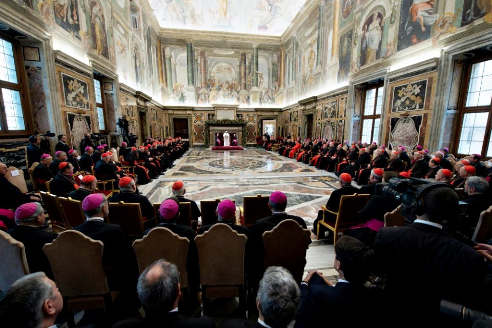 Pope Francis gives his annual pre-Christmas speech to officials of the Roman Curia and cardinals present in Rome Dec. 21 in the Clementine Hall of the Apostolic Palace. (CNS/Vatican Media)