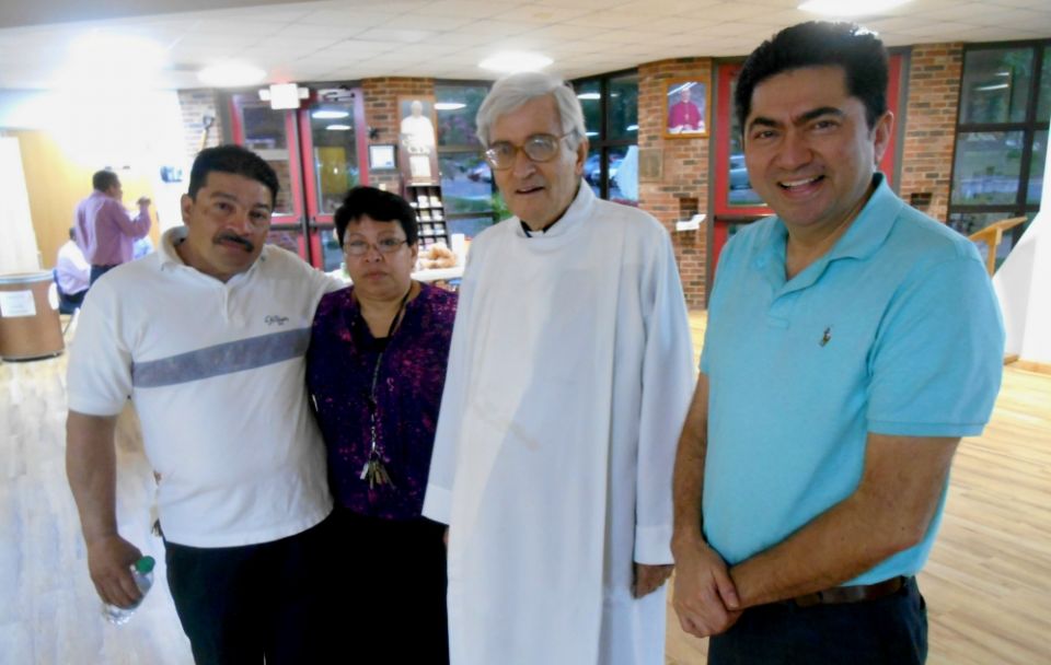 From left, Oscar and Teresa Villalobos, Fr. Philip Scarcella and Jose Zelaya