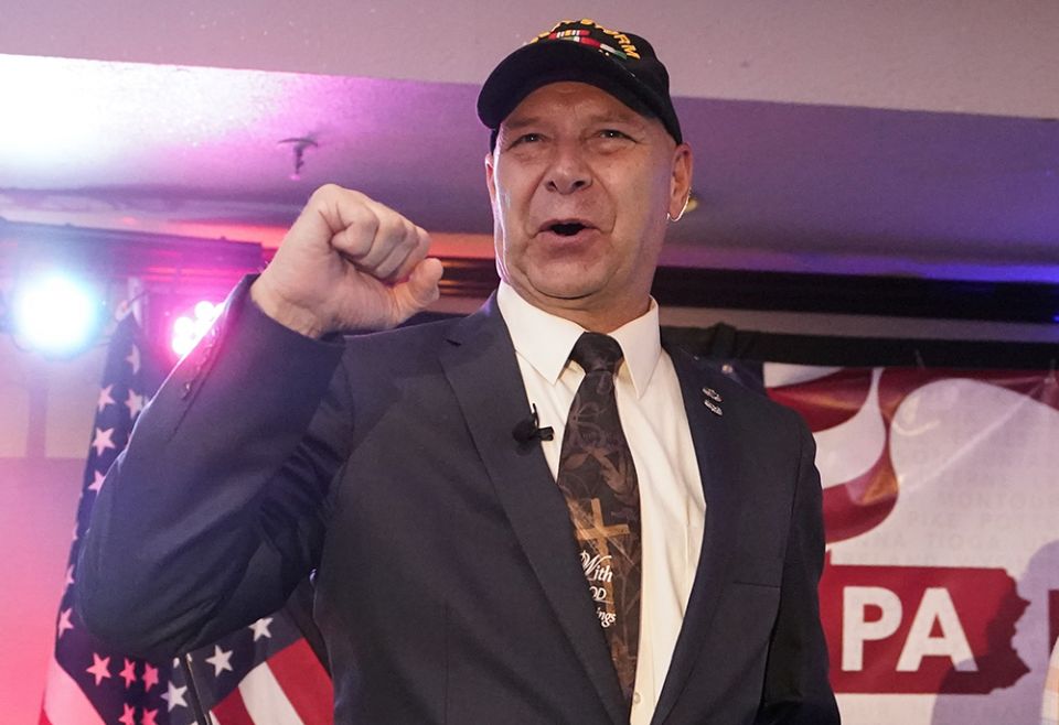 State Sen. Doug Mastriano, R-Franklin, the Republican candidate for governor of Pennsylvania, gestures to the cheering crowd during his primary night election party May 17 in Chambersburg, Pennsylvania. (AP photo/Carolyn Kaster) State Sen. Doug Mastriano, R-Franklin, the Republican candidate for governor of Pennsylvania, gestures to the cheering crowd during his primary night election party May 17 in Chambersburg, Pennsylvania. (AP photo/Carolyn Kaster)
