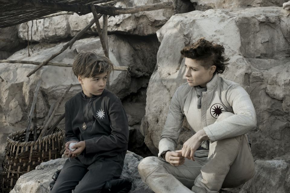 Scene from Season 1, Episode 8 of "Raised by Wolves," with Felix Jamieson, left, and Niamh Algar on HBO Max (Warner Media/Coco Van Oppens) Scene from Season 1, Episode 8 of "Raised by Wolves," with Felix Jamieson, left, and Niamh Algar on HBO Max (Warner Media/Coco Van Oppens)