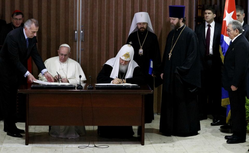 Pope Francis and Russian Orthodox Patriarch Kirill of Moscow sign their Joint Declaration at José Martí International Airport in Havana Feb. 12, 2016. (CNS/Paul Haring) Pope Francis and Russian Orthodox Patriarch Kirill of Moscow sign their Joint Declaration at José Martí International Airport in Havana Feb. 12, 2016. (CNS/Paul Haring)