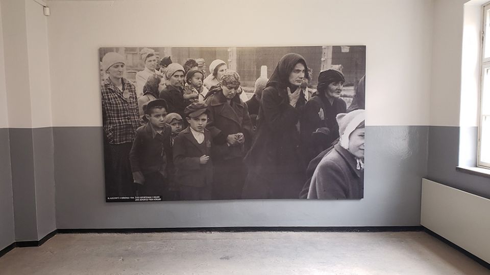 An enlarged photograph at the Auschwitz-Birkenau concentration-death camp shows Jewish deportees from Hungary arriving at the facility in 1944. (NCR photo/Chris Herlinger)