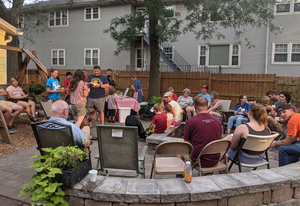 A gathering in the backyard outside at Romero House in Ames, Iowa (Courtesy of Matt Mitchell)