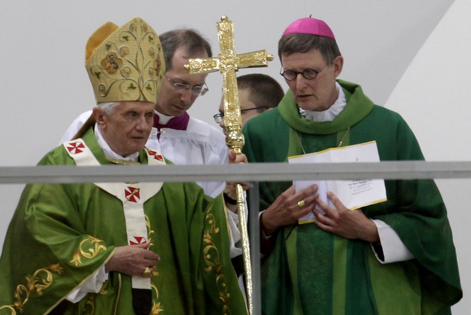 Pope Benedict XVI, left, who retired in 2013, speaking to Berlin's Archbishop Rainer Maria Woelki, right, at a mass at the Olympic Stadium in Berlin, Germany, Jan 6, 2012. (AP Photo/Michael Sohn) Pope Benedict XVI, left, who retired in 2013, speaking to Berlin's Archbishop Rainer Maria Woelki, right, at a mass at the Olympic Stadium in Berlin, Germany, Jan 6, 2012. (AP Photo/Michael Sohn)