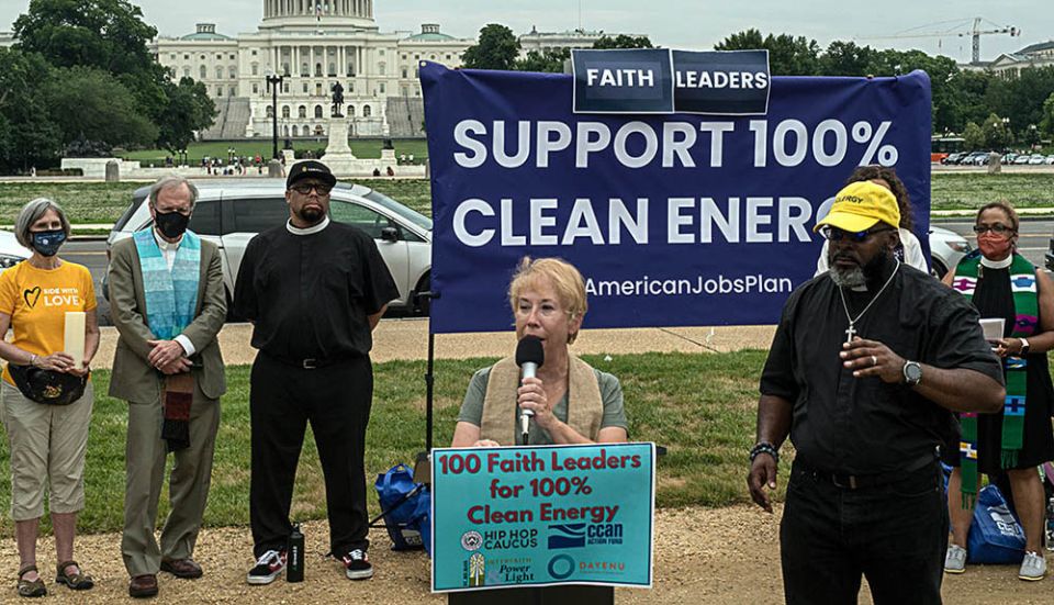 The Rev. Susan Hendershot, president of Interfaith Power & Light, and the Rev. Michael Malcom of Alabama Interfaith Power & Light, speak during the "100 Leaders for 100% Clean Energy" rally on June 9. (Courtesy of Interfaith Power & Light) The Rev. Susan Hendershot, president of Interfaith Power & Light, and the Rev. Michael Malcom of Alabama Interfaith Power & Light, speak during the "100 Leaders for 100% Clean Energy" rally on June 9. (Courtesy of Interfaith Power & Light)