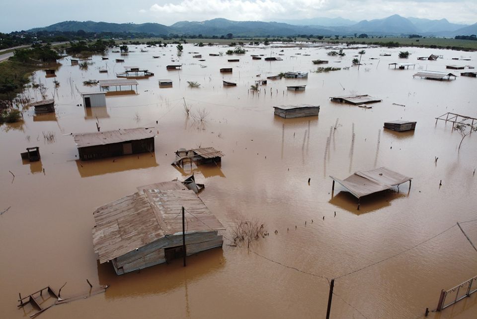 The town of Pimienta, Honduras, was flooded during Hurricane Iota in November 2020. While a lot of people were prepared, the flash flooding caught many by surprise and they lost all their belongings. (Photo courtesy of Sean Hawkey, World Council of Church