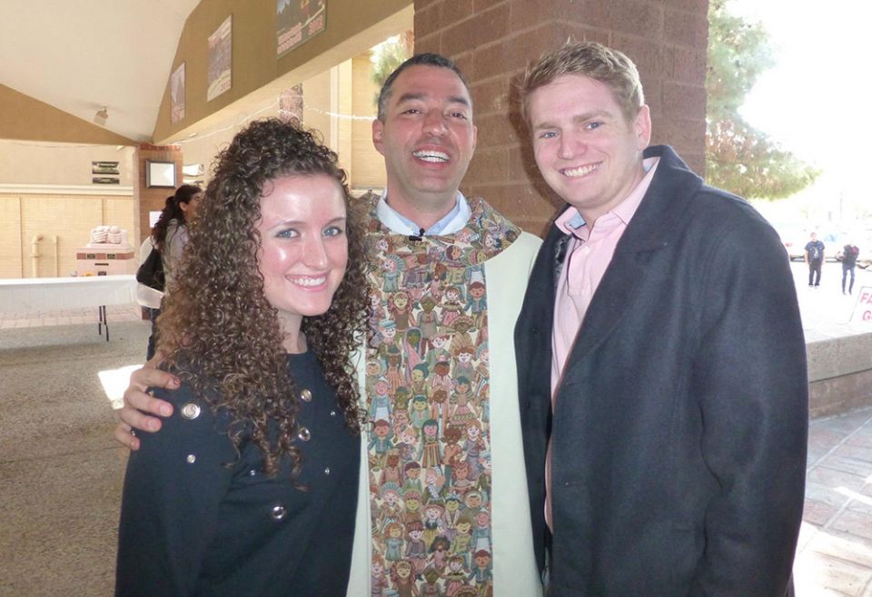Kimberly Roland standing with Fr. Andrés Arango and her now husband Brendan Brady outside St. Jerome Parish in Phoenix, from around 2012-13 (Courtesy of Kimberly Roland) Kimberly Roland standing with Fr. Andrés Arango and her now husband Brendan Brady outside St. Jerome Parish in Phoenix, from around 2012-13 (Courtesy of Kimberly Roland)