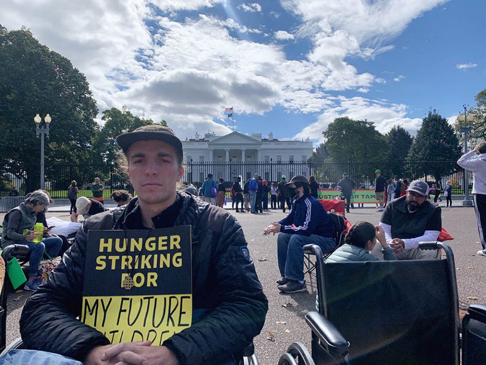 Paul Campion sits outside the White House in Washington, D.C., Oct. 26 during his hunger strike for climate action. (NCR photo/Melissa Cedillo)