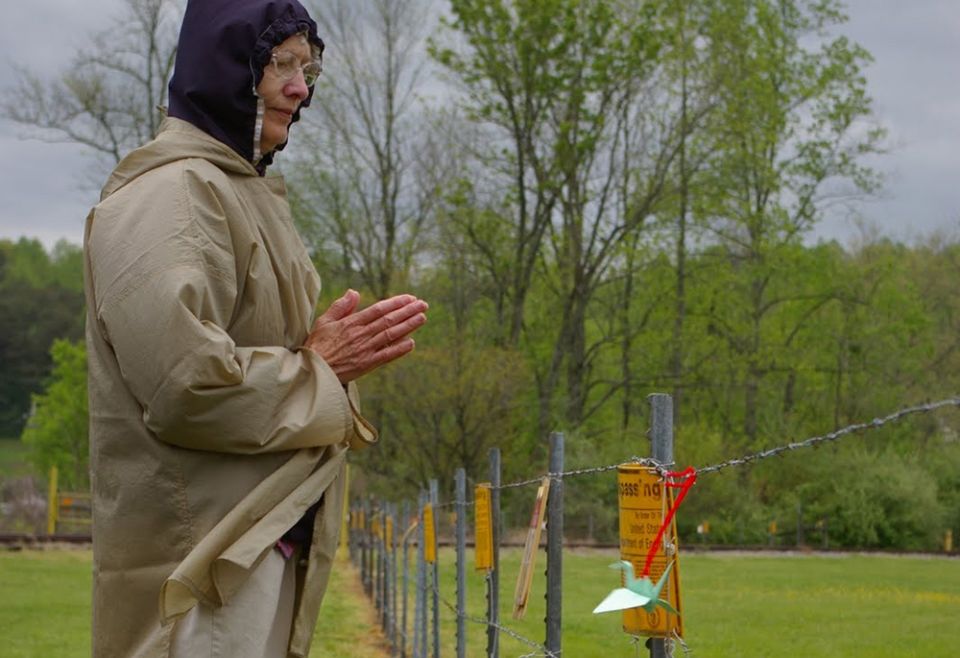 Presentation Sr. Mary Dennis Lenstch prays during a peace witness outside the Y-12 Nuclear Weapons Complex near Oak Ridge, Tennessee, in April 2011. (NCR photo/Joshua J. McElwee) Presentation Sr. Mary Dennis Lenstch prays during a peace witness outside the Y-12 Nuclear Weapons Complex near Oak Ridge, Tennessee, in April 2011. (NCR photo/Joshua J. McElwee)