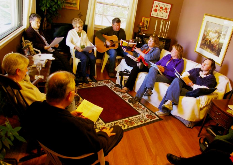 Members of the Call to Action group in Lincoln, Nebraska, sing in a prayer liturgy during a 2012 meeting at the home of Rachel Pokora. (NCR photo/Joshua J. McElwee) Members of the Call to Action group in Lincoln, Nebraska, sing in a prayer liturgy during a 2012 meeting at the home of Rachel Pokora. (NCR photo/Joshua J. McElwee)