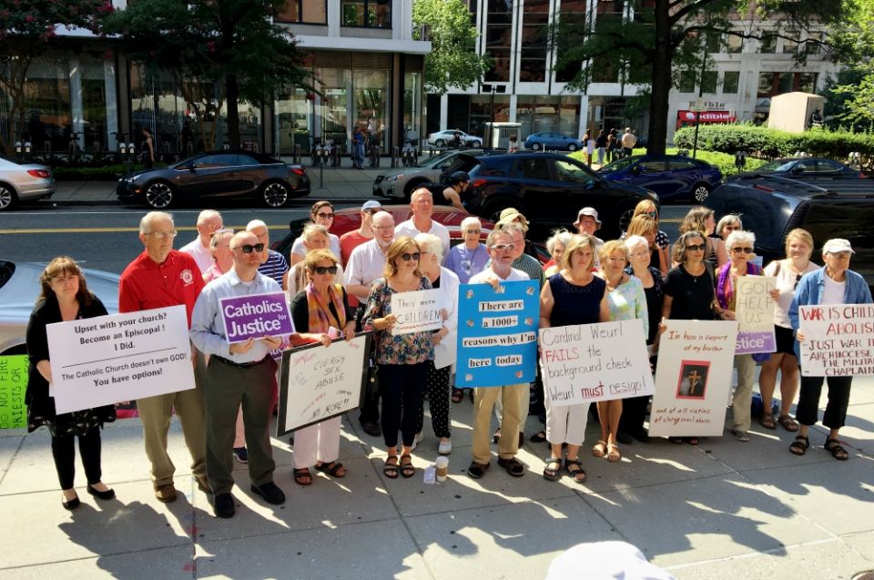Protesters, including survivors of clergy sex abuse, stand outside the Cathedral of St. Matthew the Apostle in Washington, D.C., Aug. 26. (Julie Bourbon)