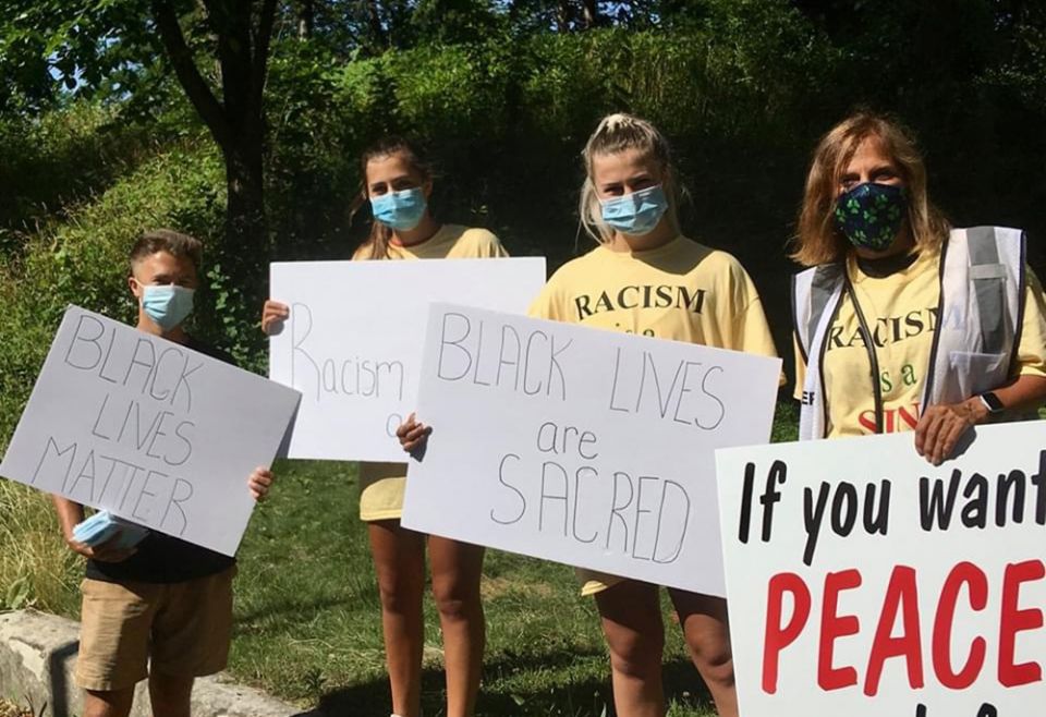 Anne Haines, right, with children Cullen, Danielle and Brianna at a "Black Lives are Sacred" march in Milwaukee (Courtesy of Anne Haines) Anne Haines, right, with children Cullen, Danielle and Brianna at a "Black Lives are Sacred" march in Milwaukee (Courtesy of Anne Haines)