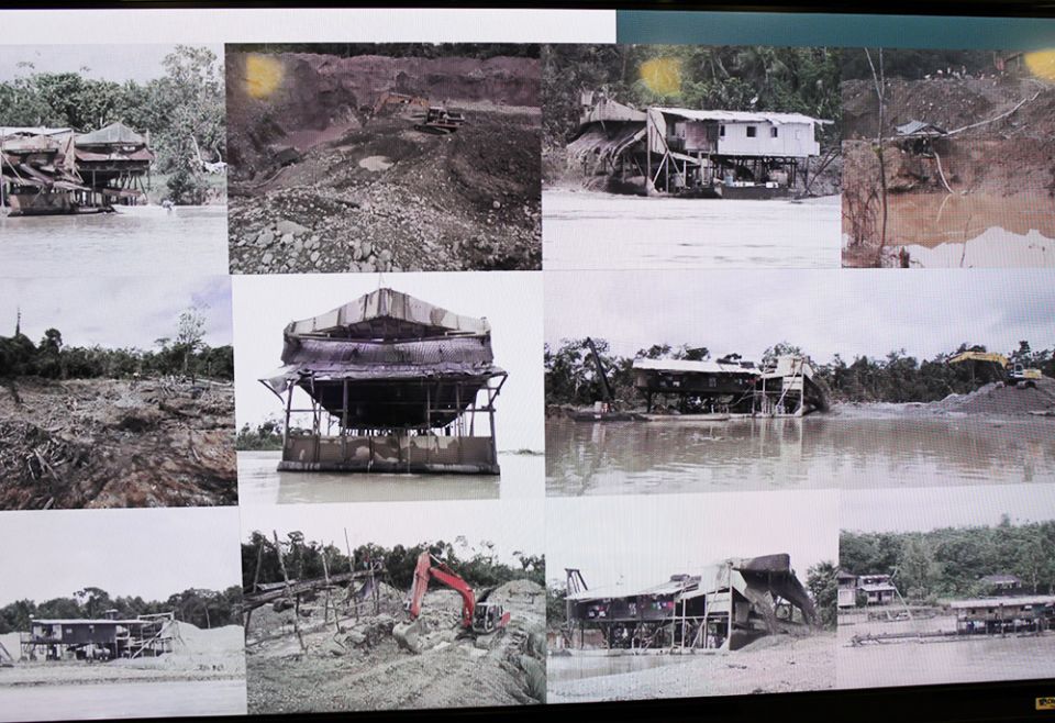 A collage of images depicts the effects of large-scale mining and logging on the Atrato River region in Colombia during an event at the University of Glasgow, in Scotland, Nov. 3 during the COP26 United Nations climate change conference. (NCR)