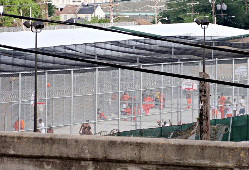 The yard of Orleans Parish Prison in New Orleans is seen from the overpass of what was then Jefferson Davis Parkway in 2012. Last year, the parkway was renamed for Norman Francis, former president of Xavier University of Louisiana. (Flickr/Bart Everson) The yard of Orleans Parish Prison in New Orleans is seen from the overpass of what was then Jefferson Davis Parkway in 2012. Last year, the parkway was renamed for Norman Francis, former president of Xavier University of Louisiana. (Flickr/Bart Everson)