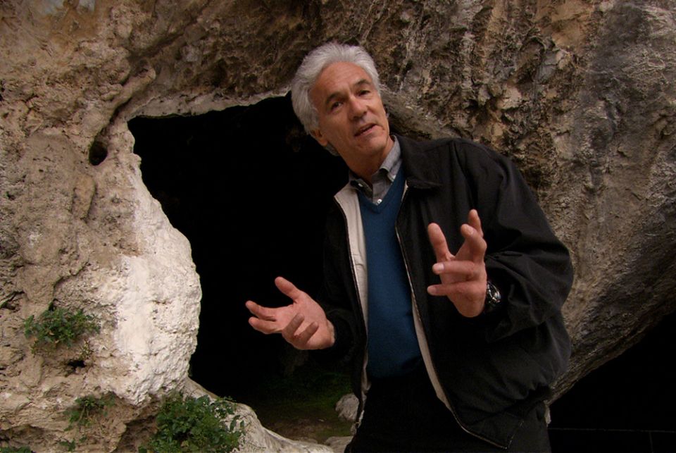 Brian Swimme stands outside the cave of Pythagoras on the island of Samos during "Journey of the Universe." (Courtesy of Journey of the Universe)