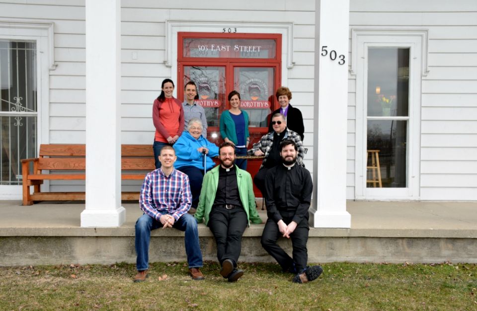 The outreach team of the Catholic Community of Flint in front of Dorothy's House of Coffee in Flint, Michigan (Kim's Photography) The outreach team of the Catholic Community of Flint in front of Dorothy's House of Coffee in Flint, Michigan (Kim's Photography)