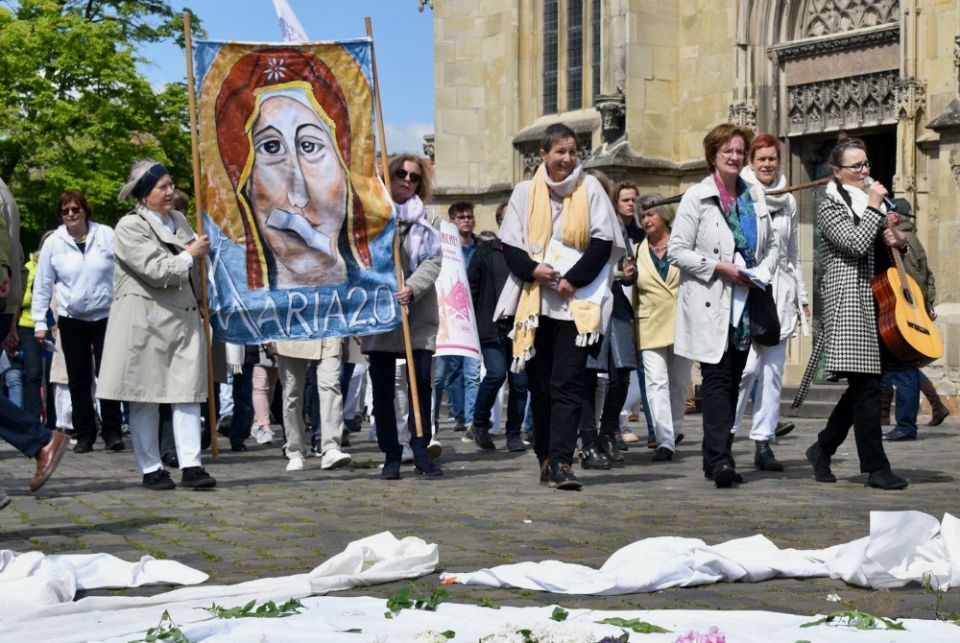 People in the Maria 2.0 movement protest outside Holy Cross Church in Münster, Germany, in May. (Ruth Koch) People in the Maria 2.0 movement protest outside Holy Cross Church in Münster, Germany, in May. (Ruth Koch)