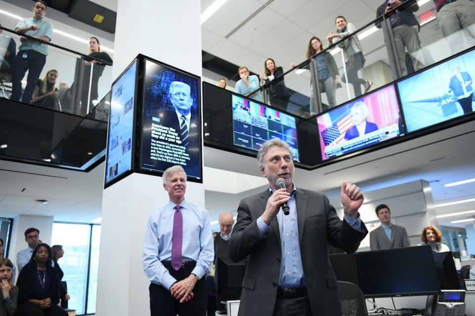 Executive Editor Martin Baron, holding microphone, speaks to staff at The Washington Post in this undated photo. (Courtesy of The Washington Post)
